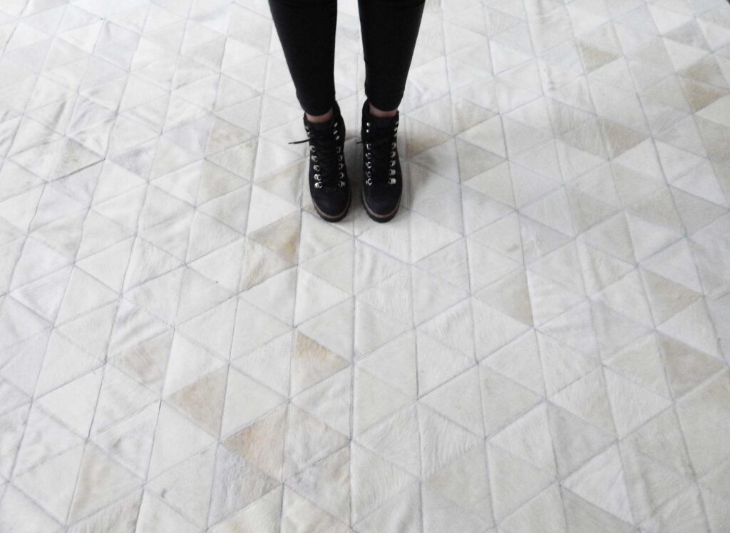 white KATA patchwork cowhide rug design