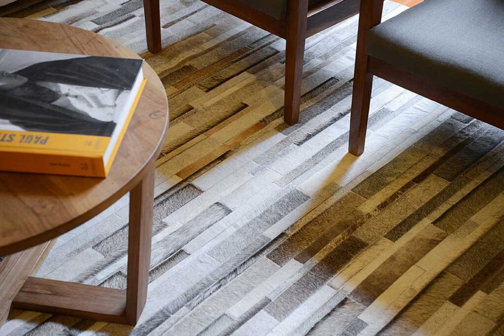 Detail of Gray, Beige, White Leather Area Rug