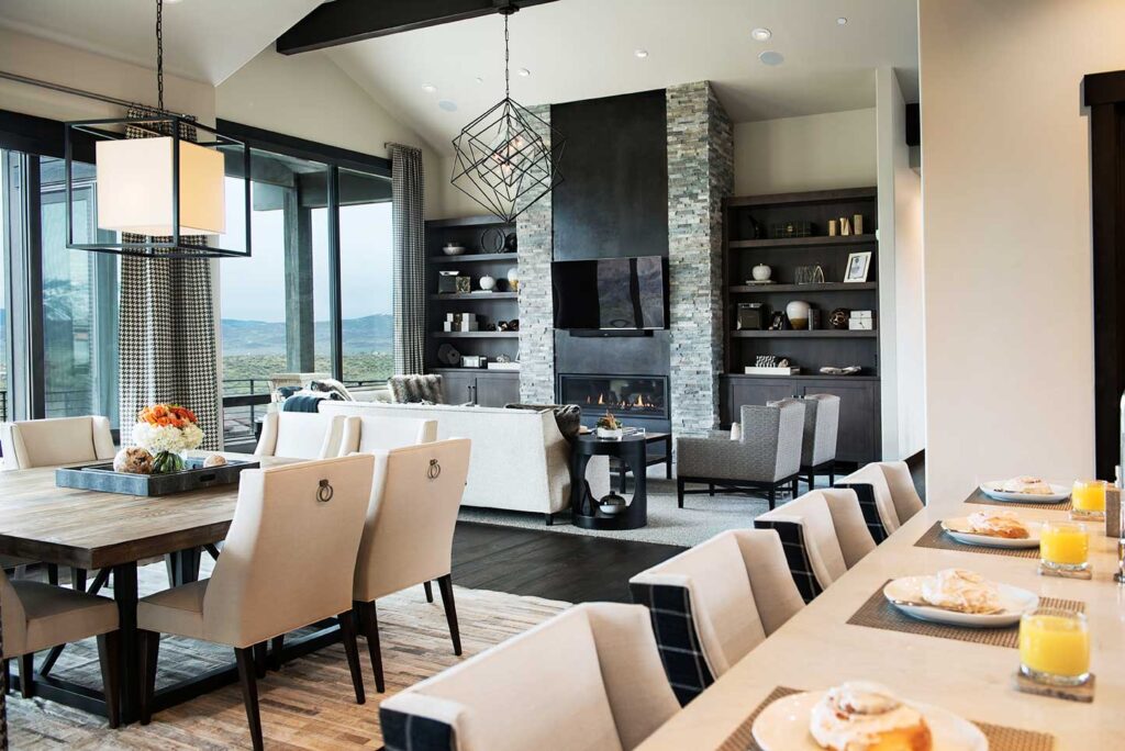 White and Gray Patchwork Cowhide Rug in stripes in dining room