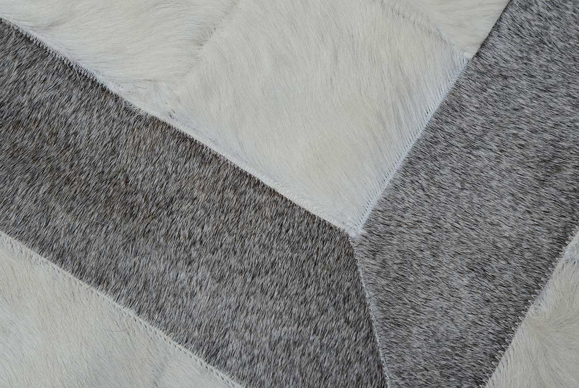 Detail of our White and Gray Leather Area Rug in Squares and Stripes