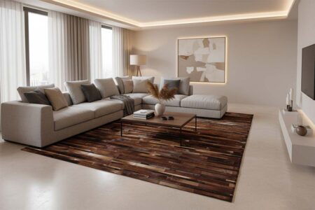 229 Iridescent Brown Cowhide Rug in Stripes in a modern and well lit, spacious living room in gray and beige toned decor Iridescent Brown Cowhide Rug in Stripes in a modern and well lit, spacious living room in gray and beige toned decor