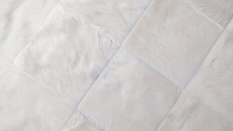 White patchwork cowhide rug in squares