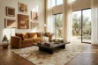 A large Beige Moorish Star Patchwork cowhide rug resting on a hardwood floor in a luxurious, sunlit modern Moroccan living room, styled with a brown velvet sofa, a dark wood coffee table, and large floor-to-ceiling windows.