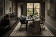Architectural Digest style dining room featuring a custom beige and white diamond patchwork cowhide rug from Málaga, Spain, styled with dark wood furniture.
