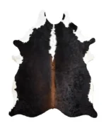Reddish-brown cowhide rug, mahogany color with white, on a white background
