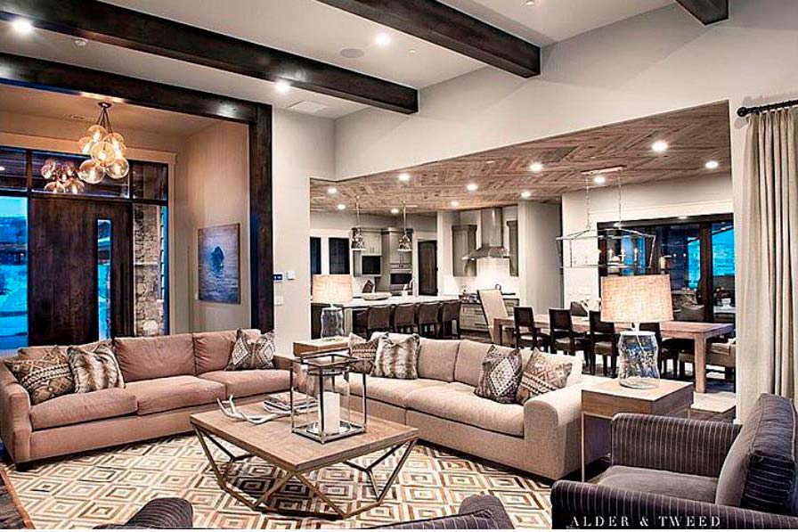 White and Beige Patchwork Cowhide Rug in elegant open plan living room