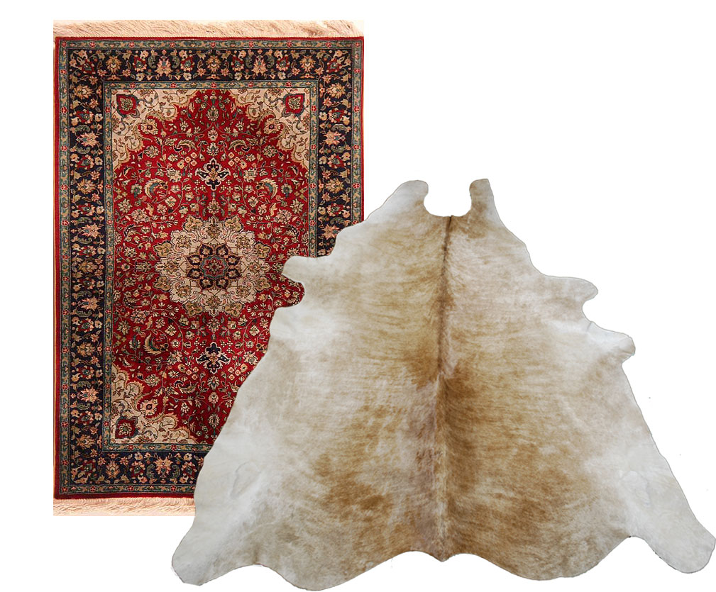 Persian rug and soft beige tiger brindle style cowhide rug