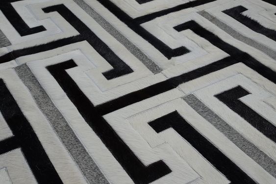 Close up of a Laberinto Patch Cowhide Rug by Shine Rugs