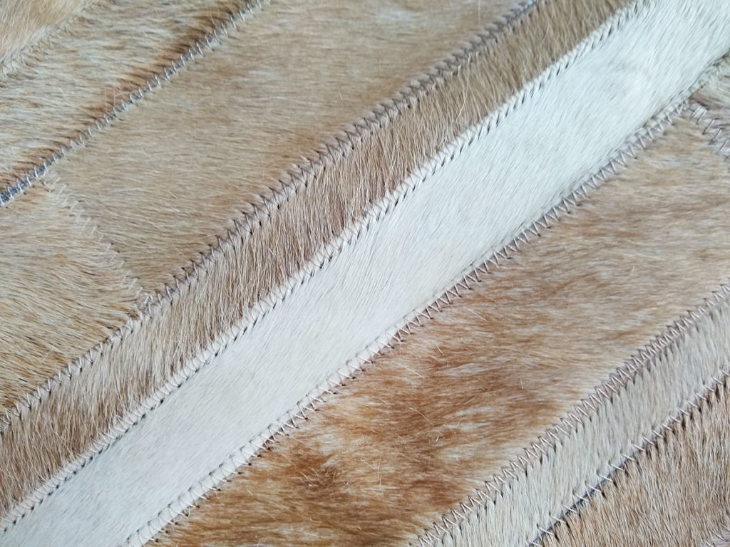 Beige Stripes Patchwork Cowhide Rug Detail