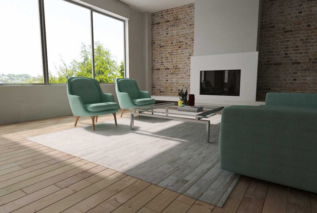 White patchwork cowhide rug in a modern living room with wooden floors