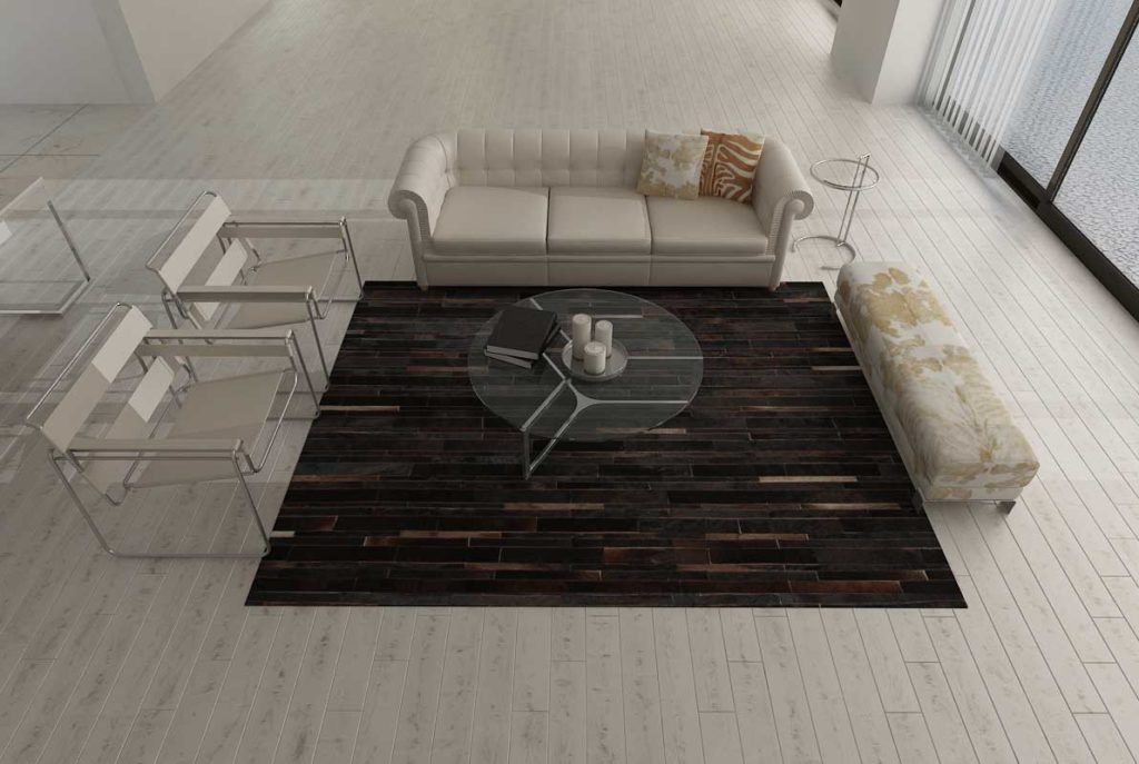 Chocolate Brown Patchwork Cowhide Rug in open bright living room