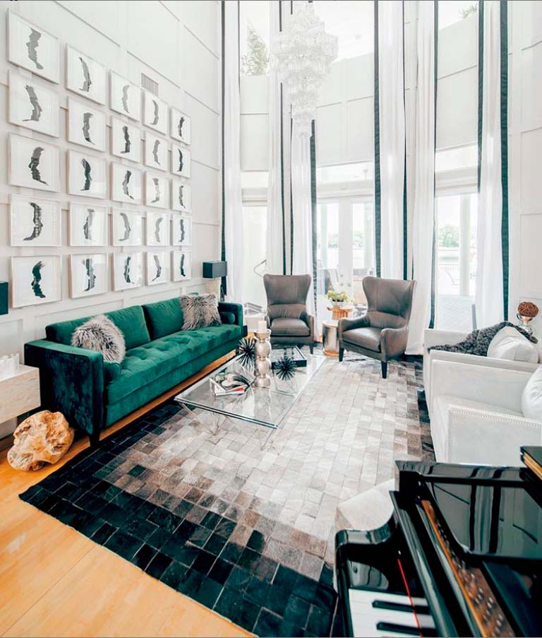 Super modern living room with a gradient patchwork cowhide rug in squares