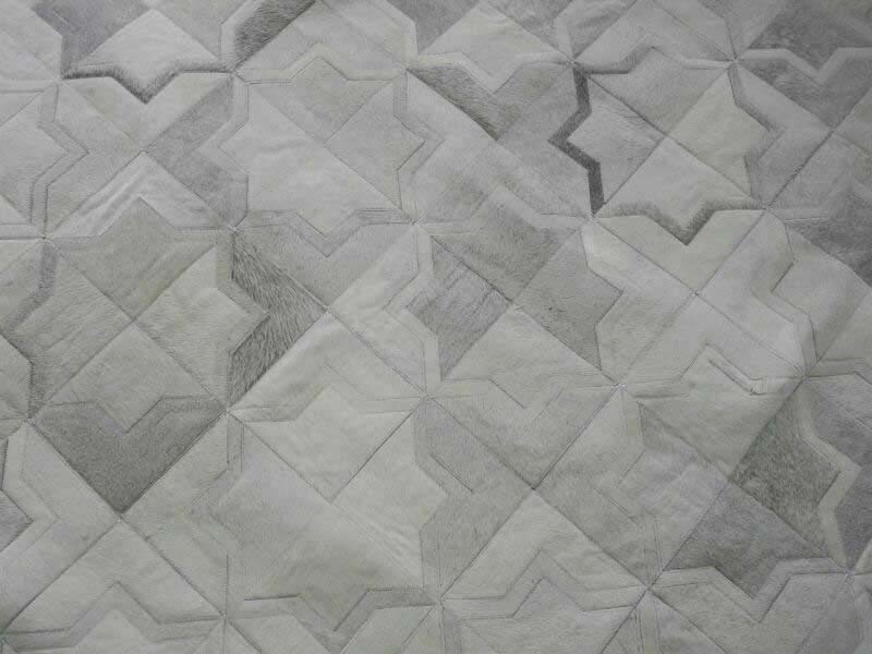 Custom Moorish Star patchwork Cowhide Rug in light gray for Emily's client
