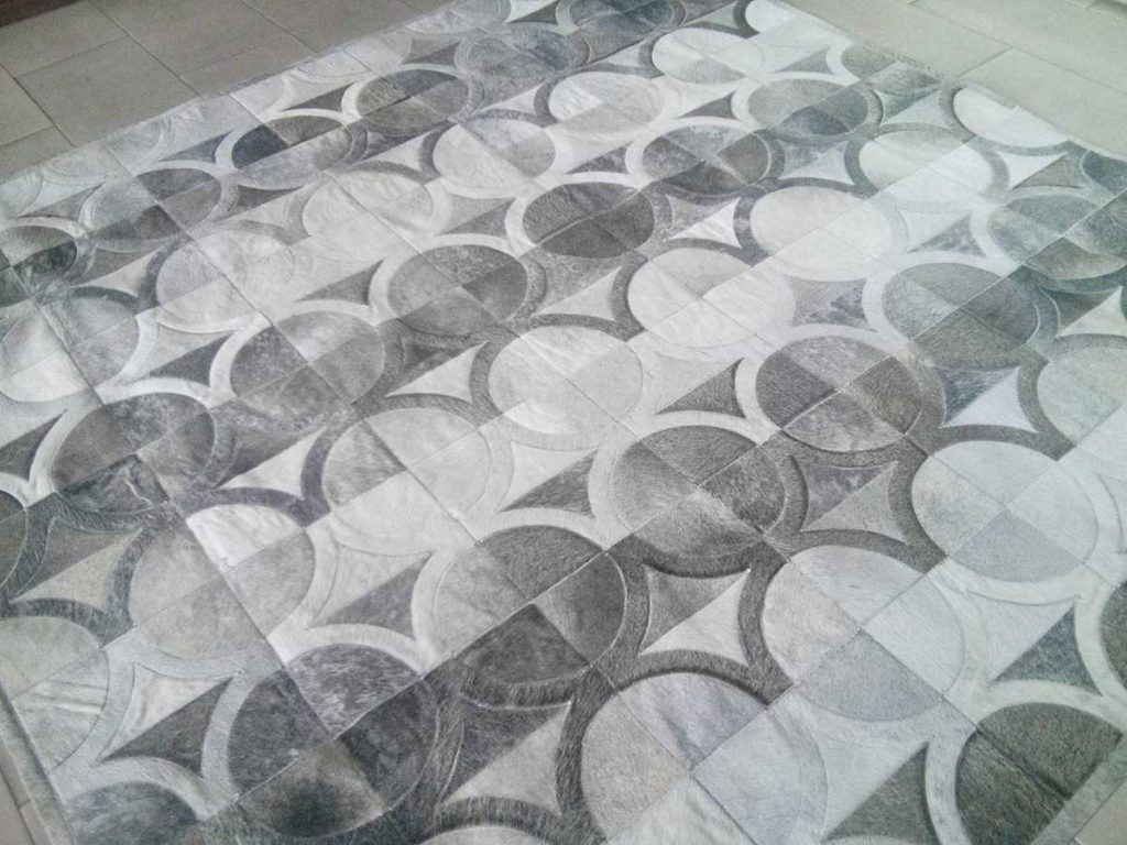 The OBO Patchwork Cowhide Rug made in gray hair