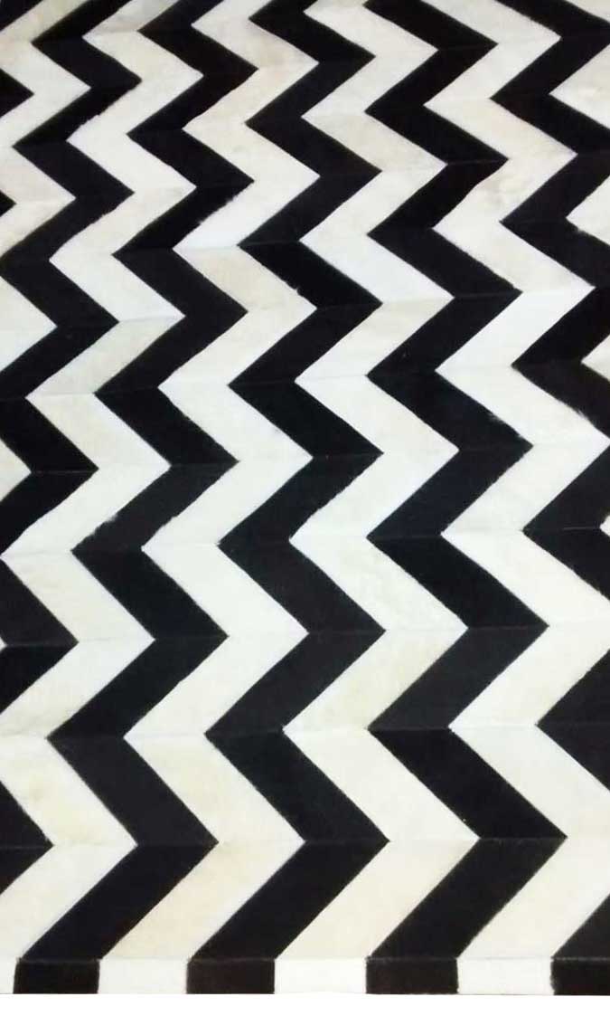 Custom border on our Black And White Chevron Patchwork Cowhide Rug Design No. 278