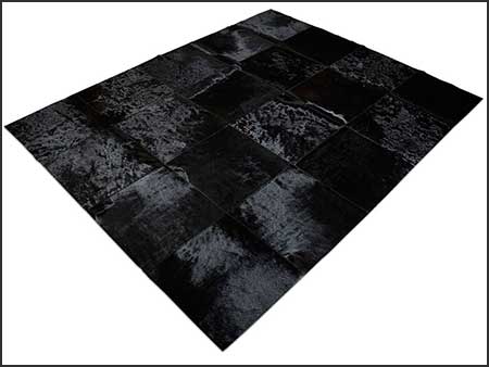 Custom patchwork rug in 16" square tiles in black cowhide