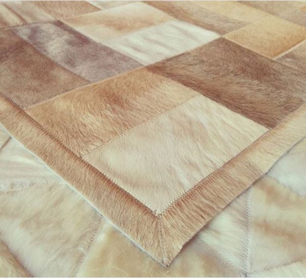 Beige patchwork cowhide rug by Shine Rugs
