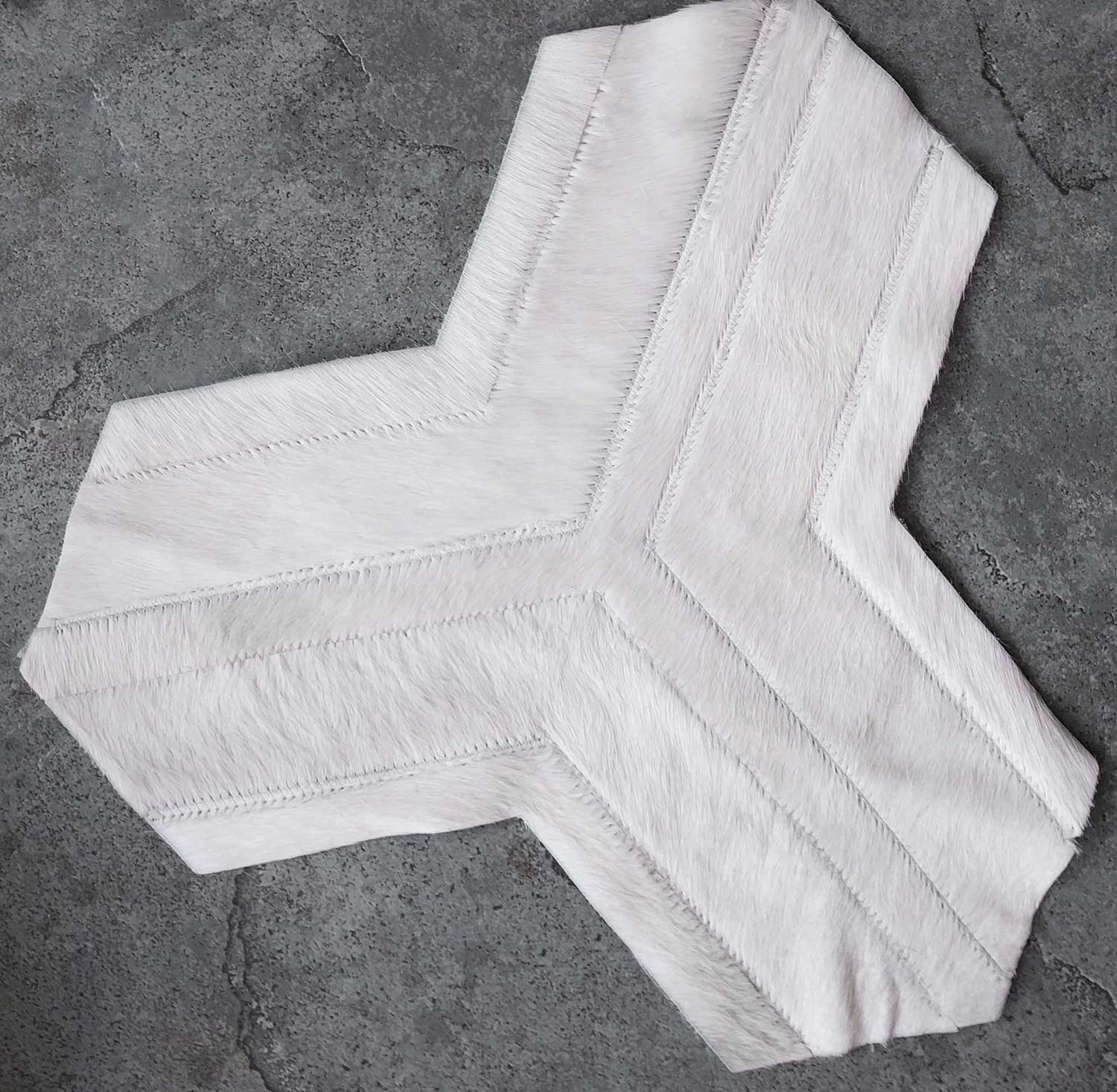 Pattern for the Toto patchwork cowhide rug by Shine Rugs