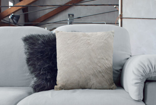 Unique Cream White Cowhide Cushion in living room