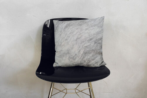 Gray Brindle Pillow on modern decor black chair.