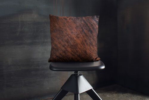 Brown Brindle Cowhide Cushion on Industrial Style Black Stool