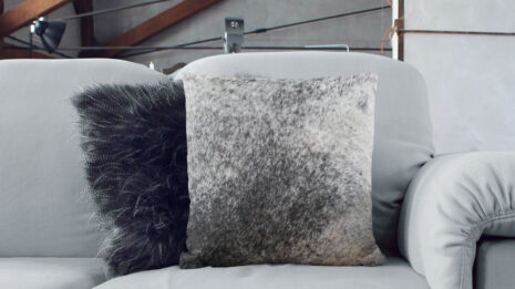 Salt and Pepper Cowhide Throw Pillow on sofa with scandi decor
