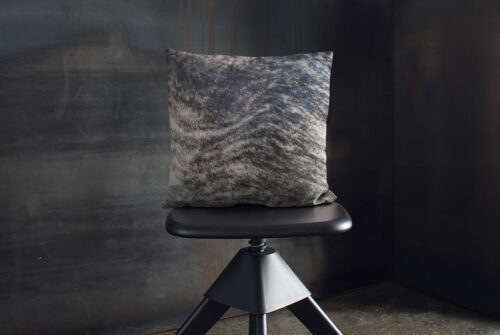 Unique Dark Brindle Cowhide Cushion with Filling on Industrial Style Decor