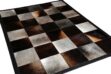 Gray and chocolate brown cowhide patchwork rug in squares with border