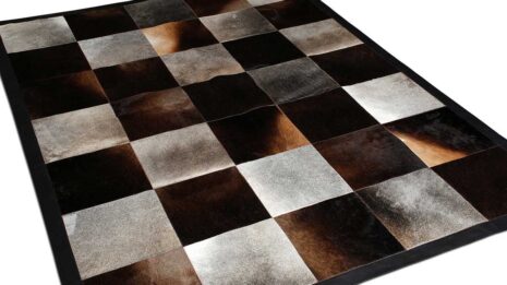 Gray and chocolate brown cowhide patchwork rug in squares with border