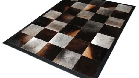 Gray and chocolate brown cowhide patchwork rug in squares with border