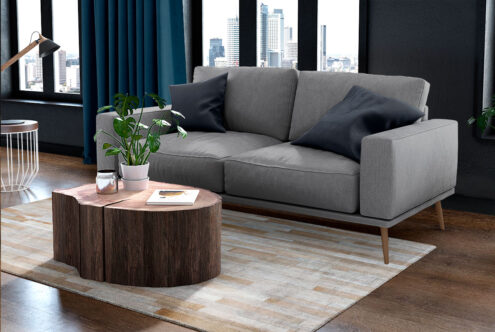 Beige and white patchwork cowhide rug Beige and white patchwork cowhide rug designed in stripes in cozy living room