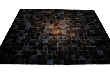 General view of a Brown and Black Patchwork Cowhide in Rug in Squares Design General view of a Brown and Black Patchwork Cowhide in Rug in Squares Design