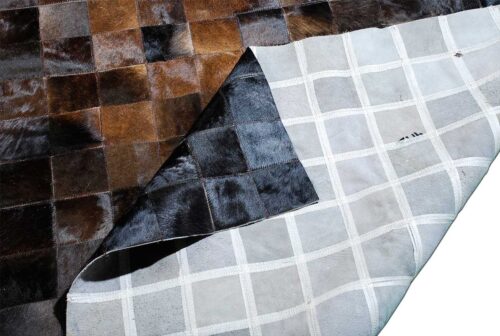 Detail of Brown and Black Patchwork Cowhide in Rug in 4 inches Squares Design with backing