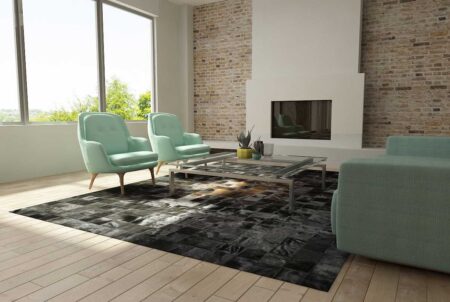 Brown and Black Patchwork Cowhide in Rug in a bright living room with aqua sofas Brown and Black Patchwork Cowhide in Rug in a bright living room with aqua sofas