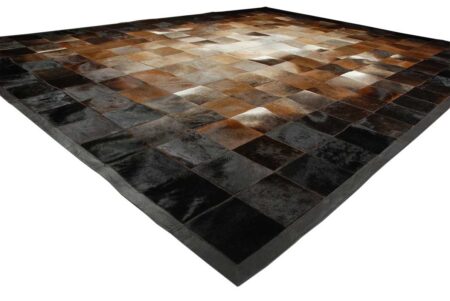Floor view of a Square tiles brown, beige and black cowhide patchwork rug Floor view of a Square tiles brown, beige and black cowhide patchwork rug