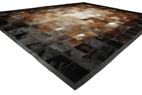 Floor view of a Square tiles brown, beige and black cowhide patchwork rug