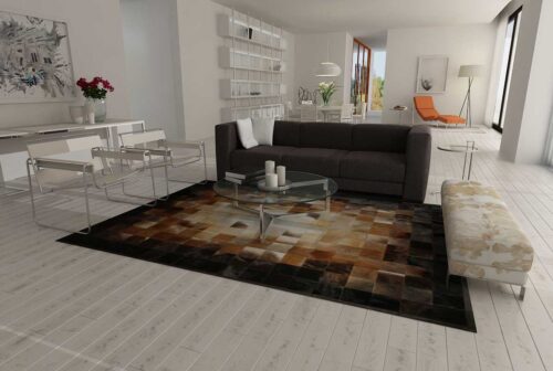 Square tiles brown, beige and black cowhide patchwork rug in a bright living room