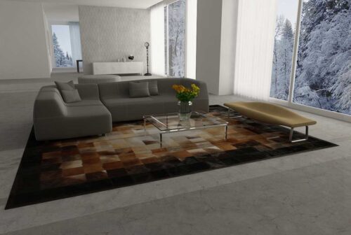 Square tiles brown, beige and black leather area rug in an open loft