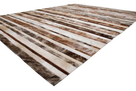 227+++ Brindle, brown and white patchwork cowhide rug in a striped design