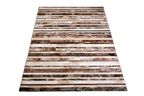Brindle, brown and white patchwork cowhide rug in a striped design