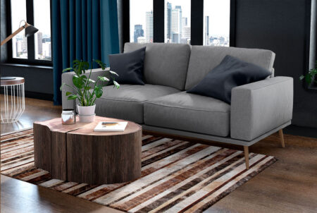 227++++++++++++ Brindle, brown and white patchwork cowhide rug in a striped design in a cozy living room