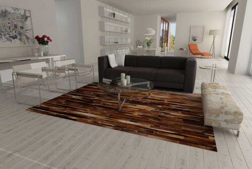 Brown patchwork cowhide rug designed in stripes in a white and modern living room