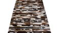 White, brown and black patchwork cowhide rug in stripes