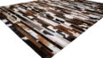 White, brown and black leather area rug in stripes