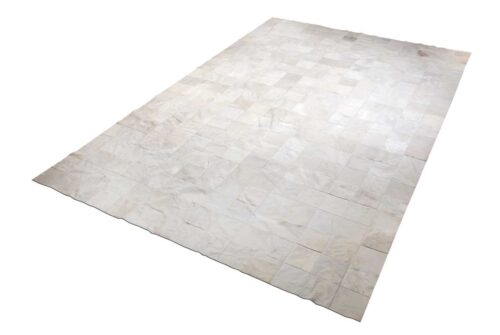 Patchwork cowhide rug in white squares