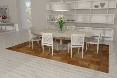 Dark Beige Cowhide Patchwork Rug in Squares in a White Dining room Dark Beige Cowhide Patchwork Rug in Squares in a White Dining room