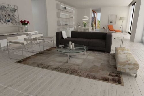 Gray brindle patchwork cowhide rug in minimal living room