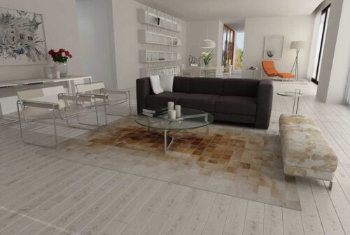Beige and Brown Gradient Patchwork Cowhide Rug in an open, big, white living room