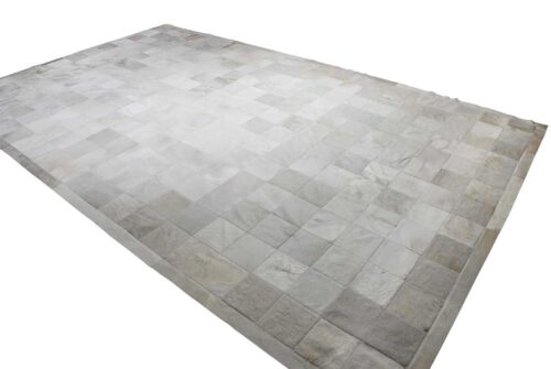 White leather area rug in squares with border