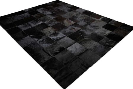 Side view of Black Patchwork Cowhide Rug in 8 inches Squares Side view of Black Patchwork Cowhide Rug in 8 inches Squares